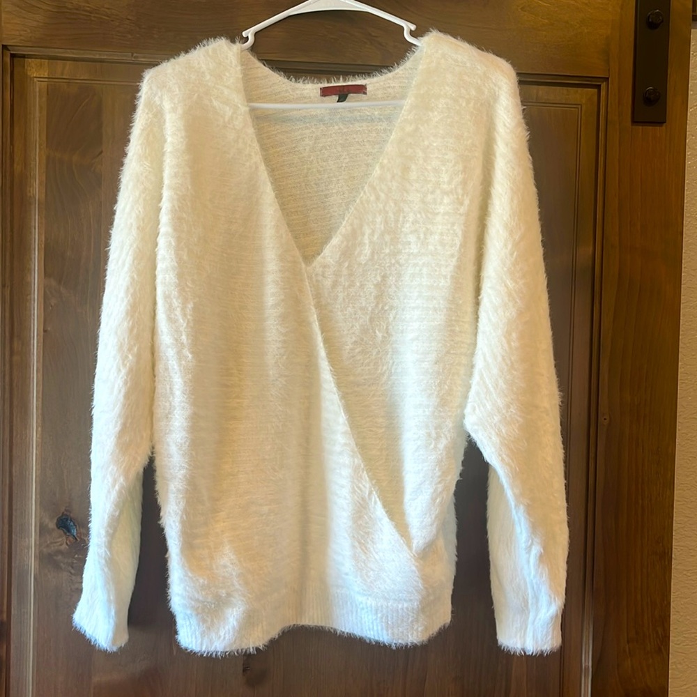White/light cream crossbody sweater….gently used.  Size medium